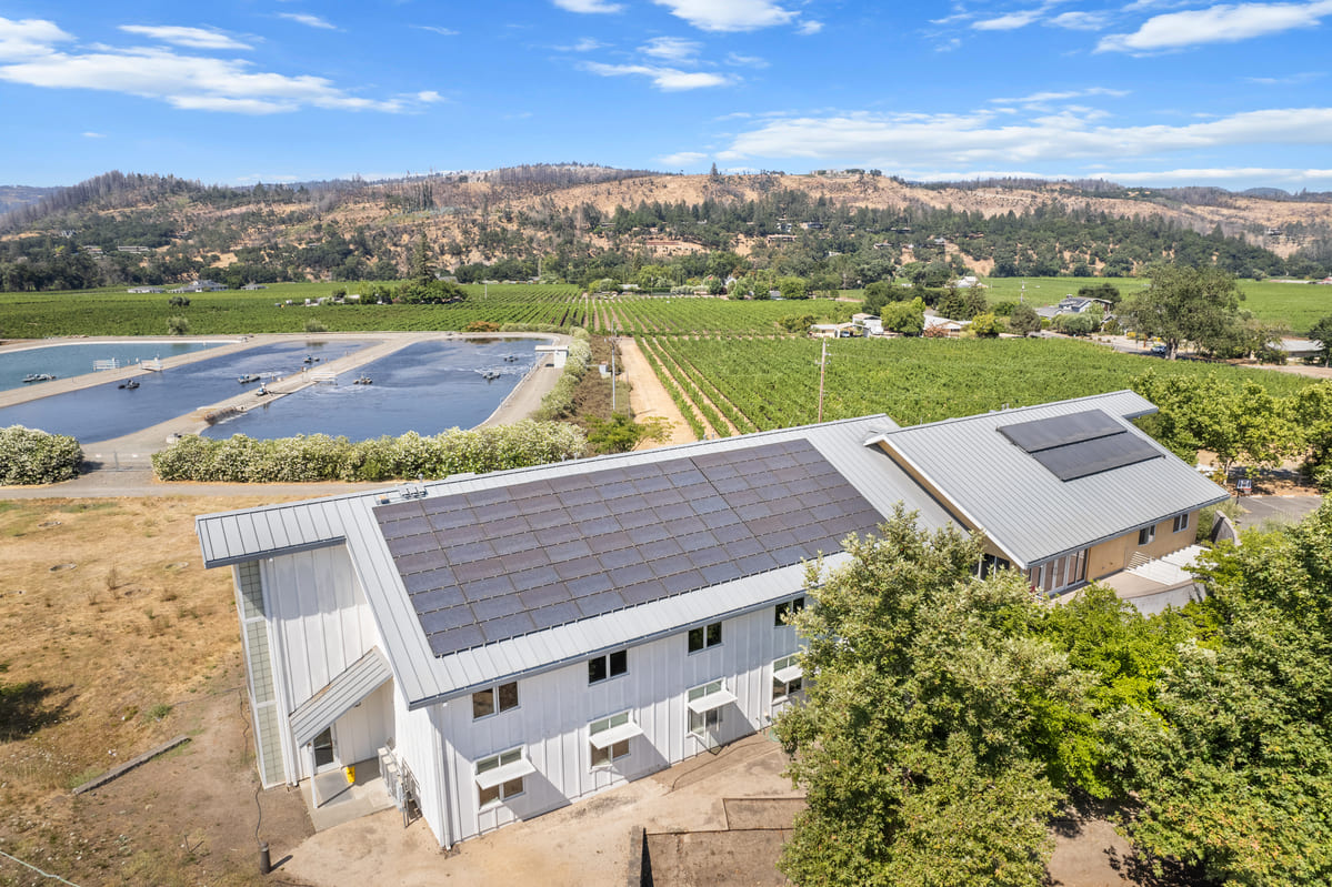 solar panels on roof and more near house
